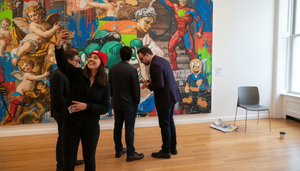 People viewing art and pop crossover mural